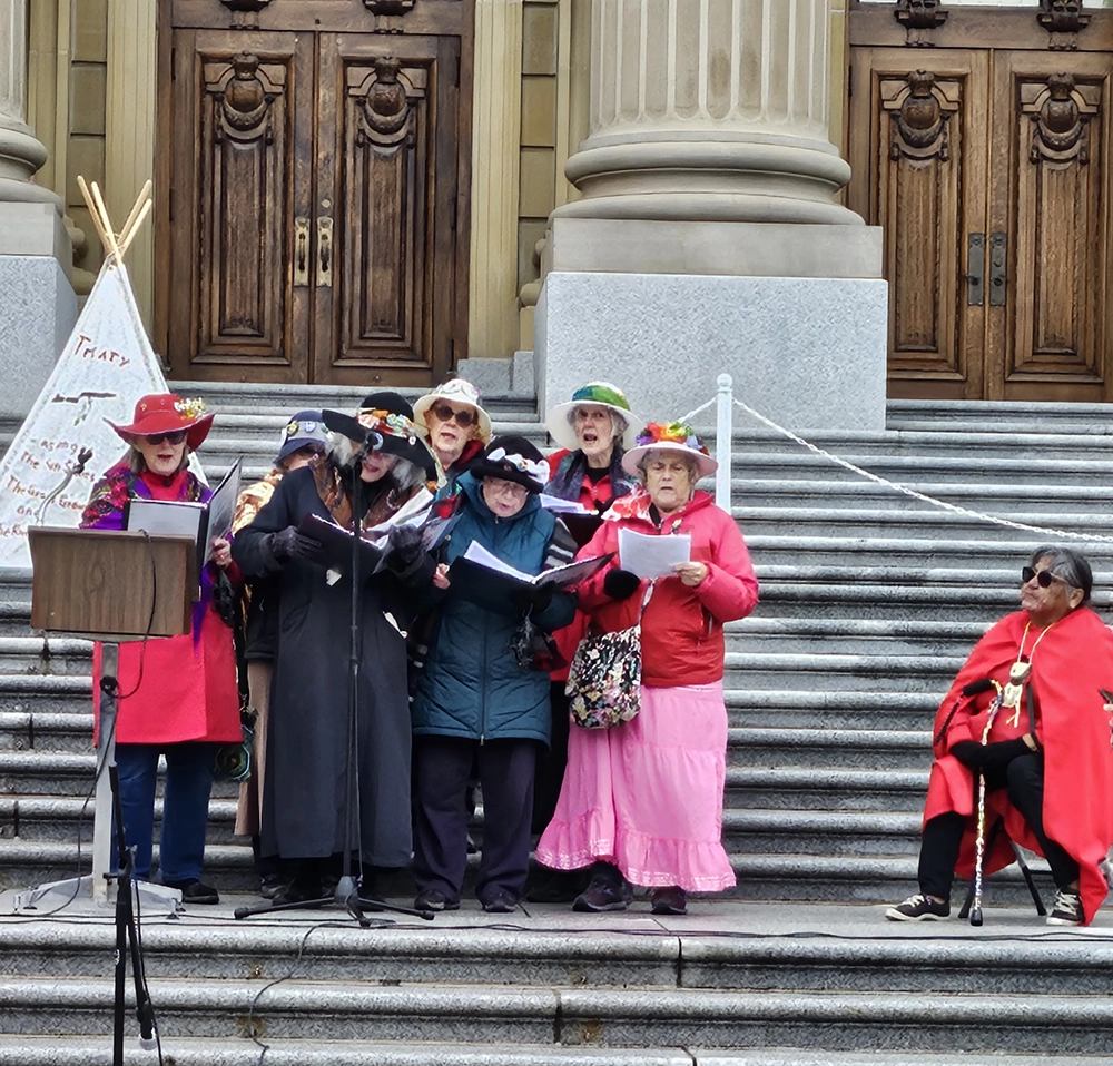 Raging Grannies performing on Alberta Legislature steps during “Enough is Enough” protest